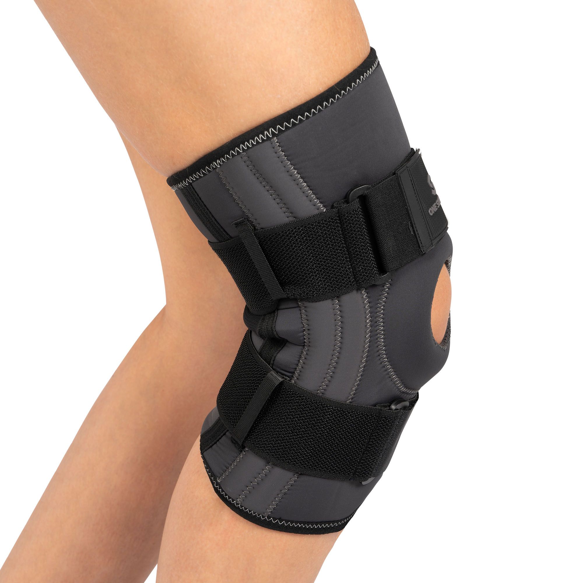 Side view of the One Support Knee Support with Busks worn around right knee