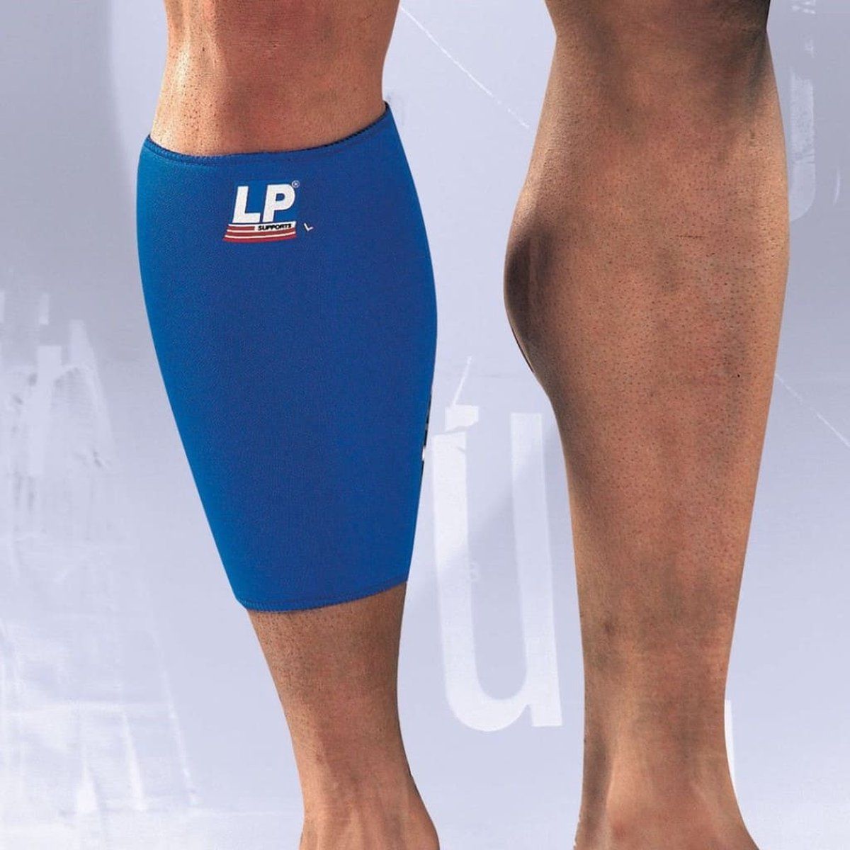 LP Support Calf Compression Sleeve worn by male model on right calf