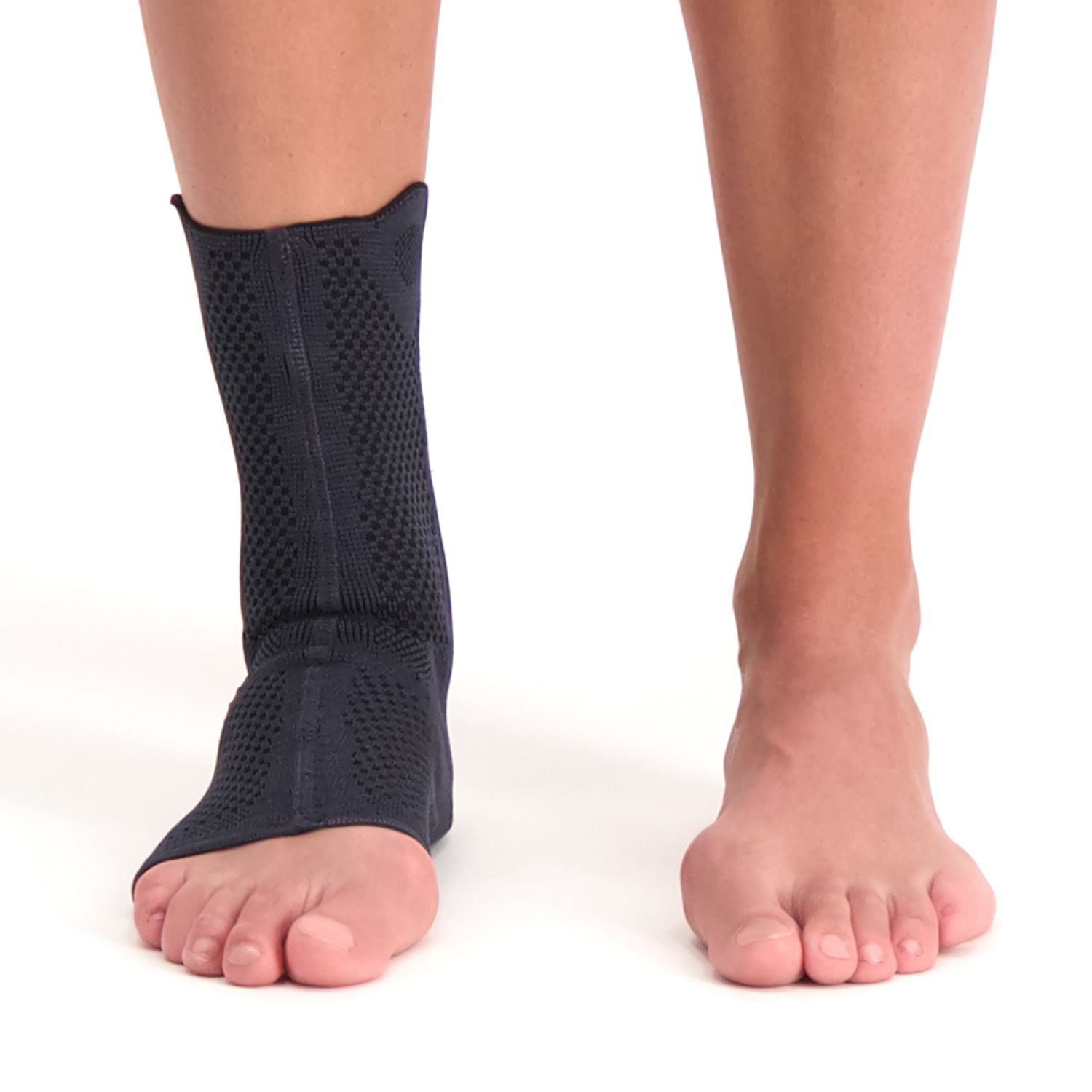 Front view of model wearing the Lyon Achilles Tendon Support with the feet flat on the ground