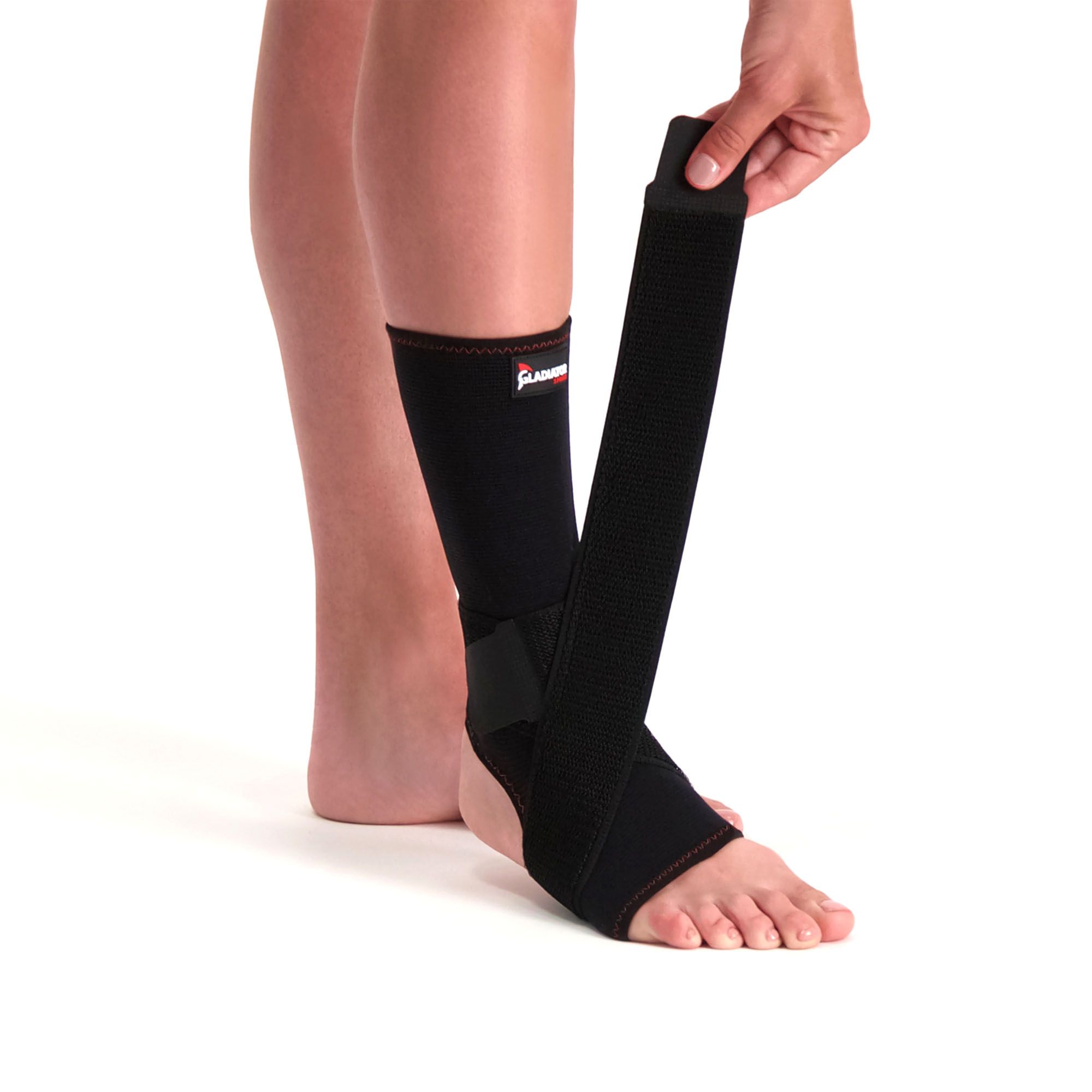 Adjusting the strap of the Gladiator Sports Premium Ankle Support