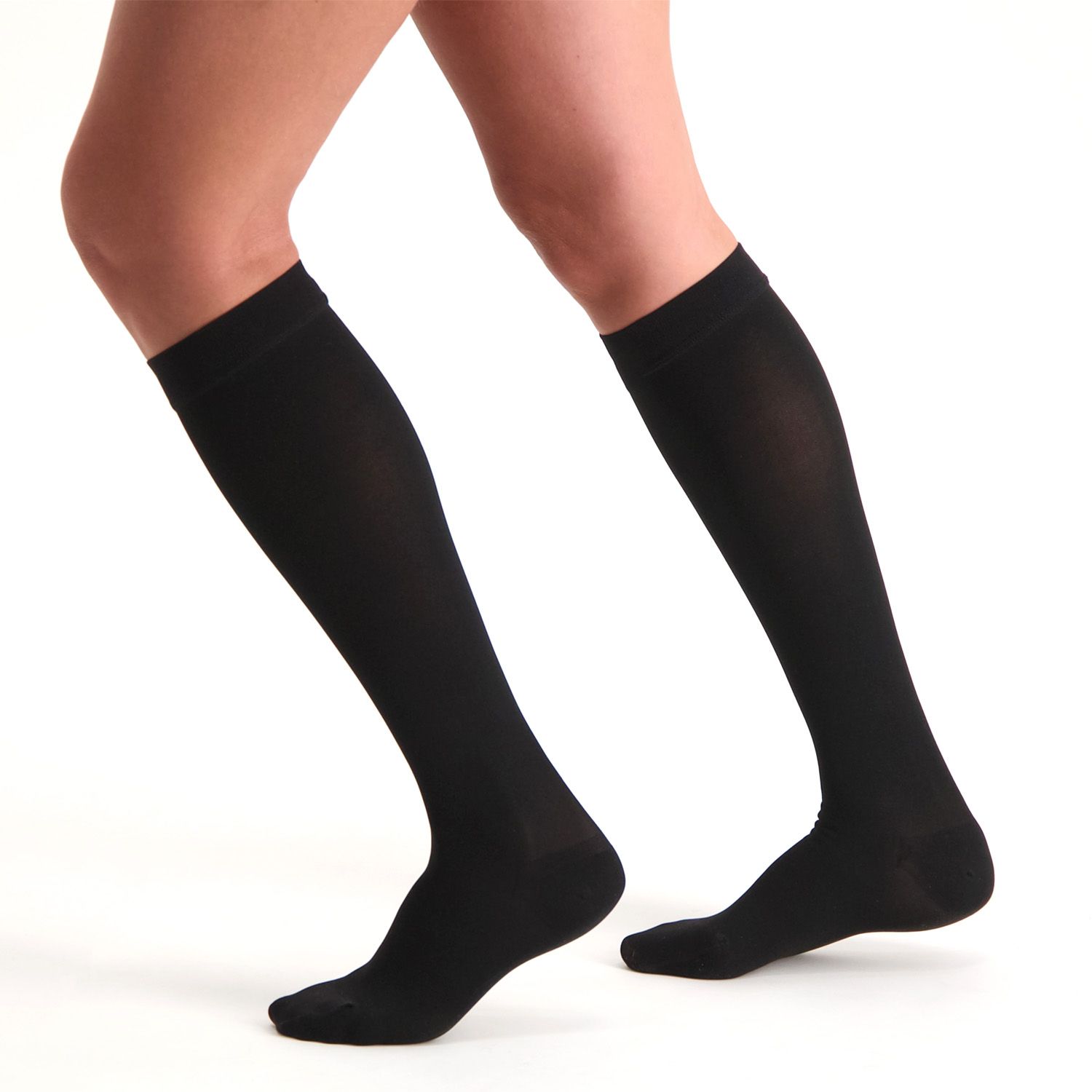 dunimed premium comfort compression stockings short closed toe in black worn by model on both legs while running