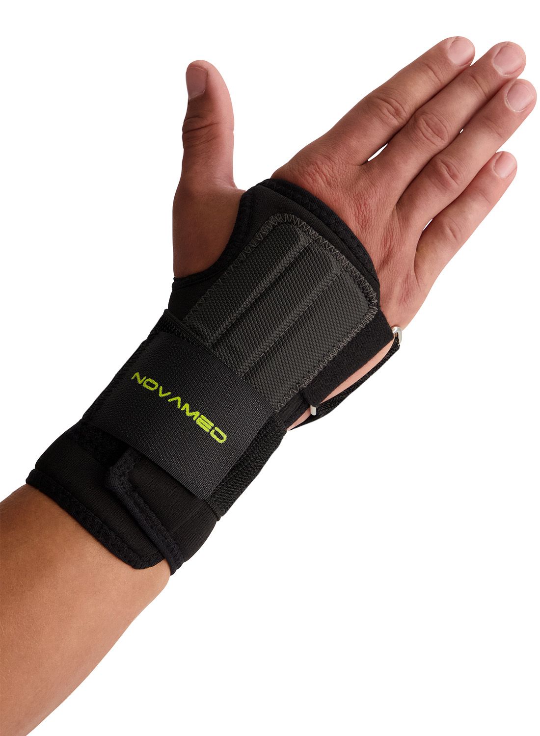 Outside view of model wearing the Novamed Lightweight Wrist Support in Black around the right wrist