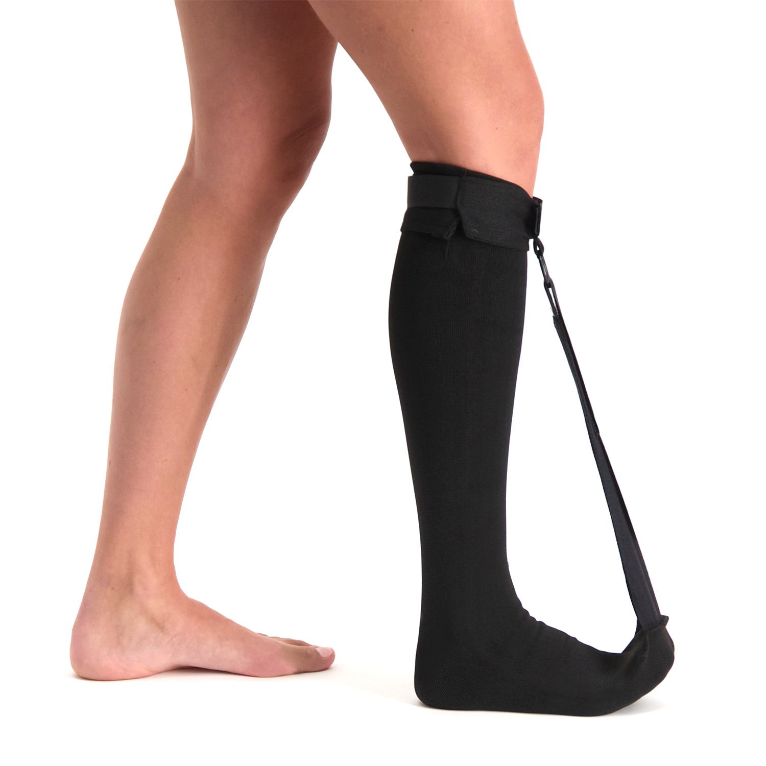 Heel Spur Sock - Night Splint worn by model with the strap lifting the toes up shown from the side