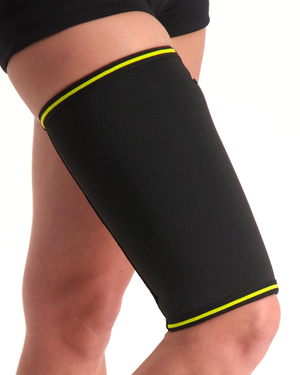 novamed thigh support worn by model around the right thigh with the knee bent