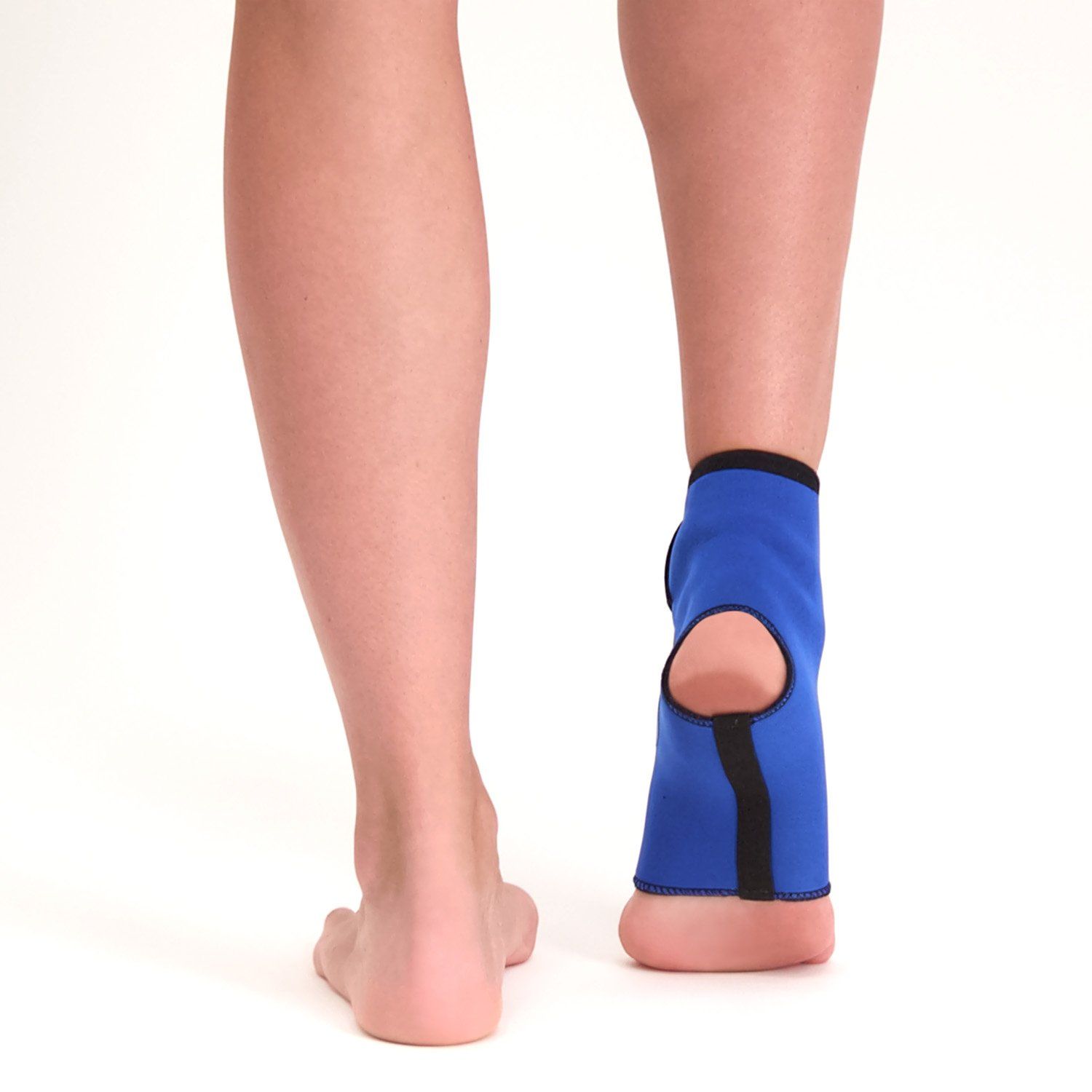 Back view of model wearing the Morsa Childrens Ankle Support around the right ankle