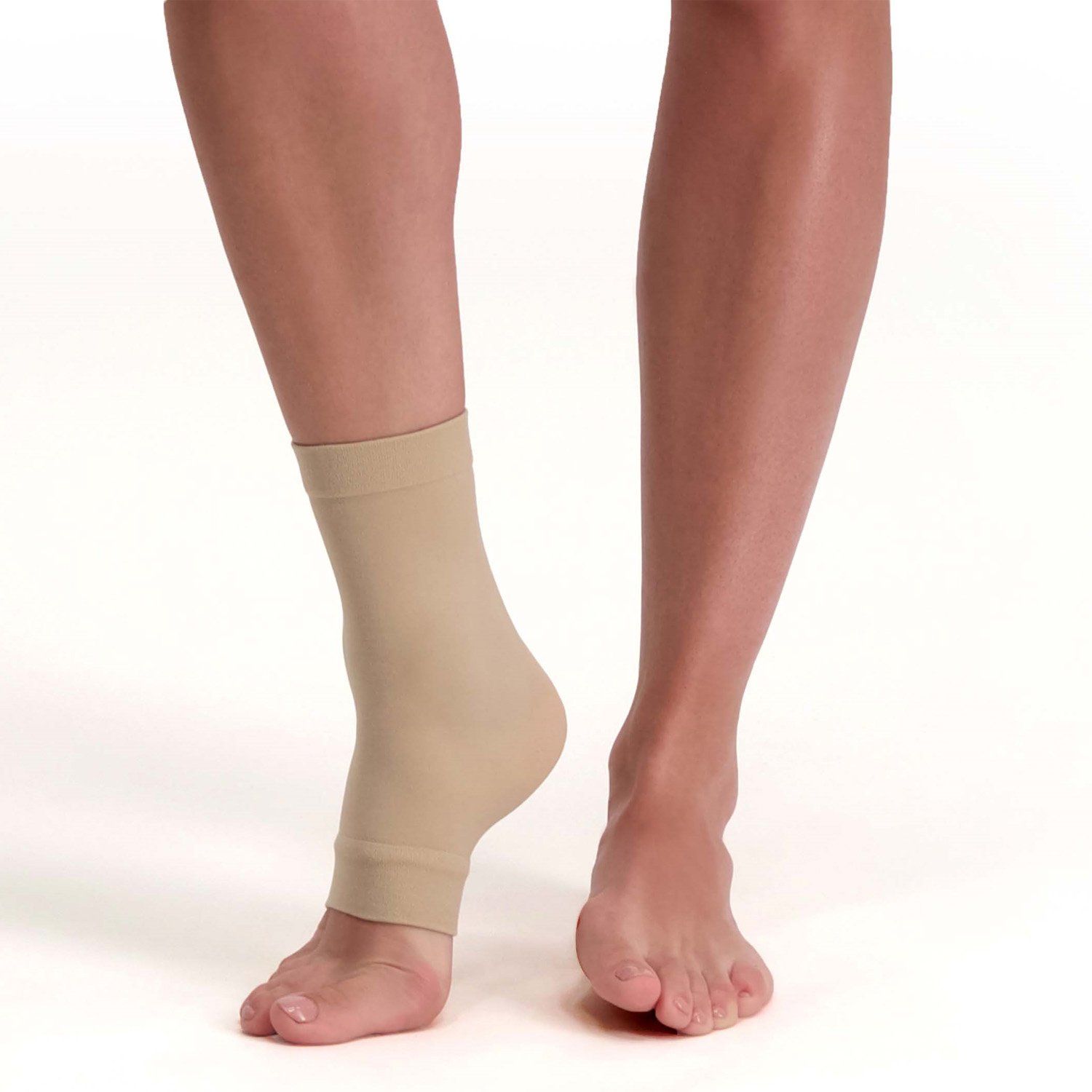 Left side view of model wearing the Solelution Ankle Gel Sock around right ankle