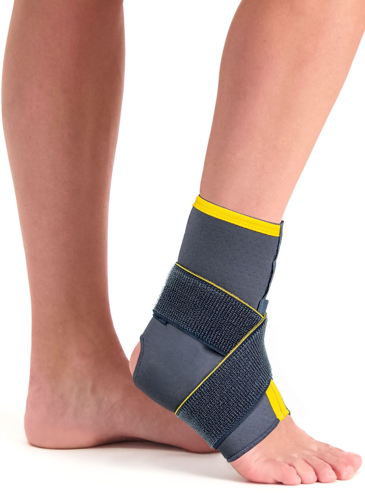 Right side view of model wearing the Morsa ThermoCY Lightweight Ankle Football Support