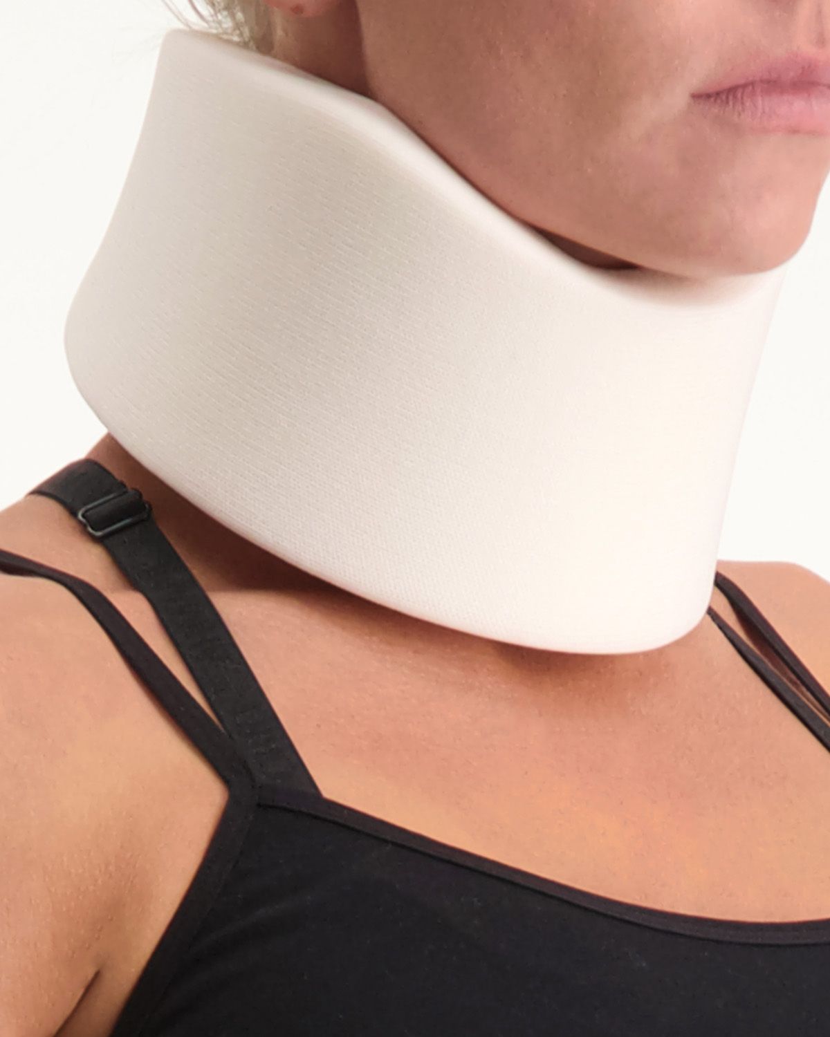 Oblique view of the Dunimed neck brace worn by women