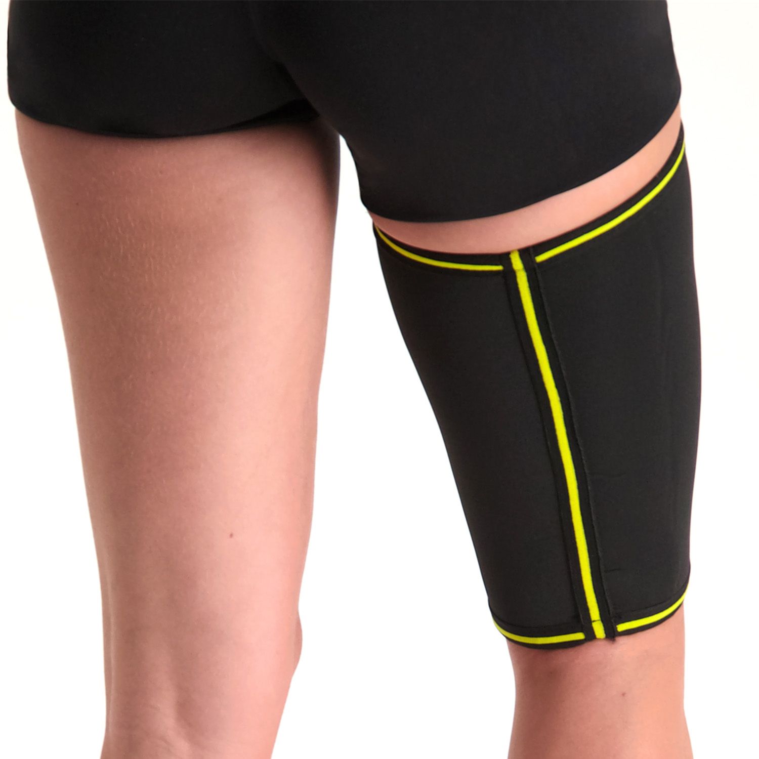 novamed thigh support worn by model around the right thigh shown from the back