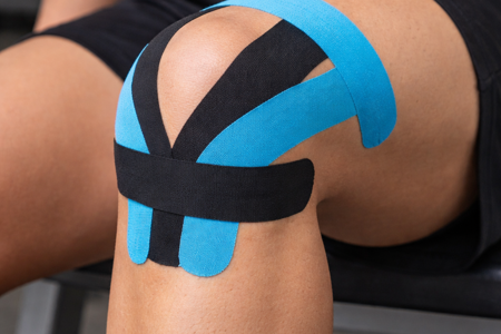 knee tape or brace