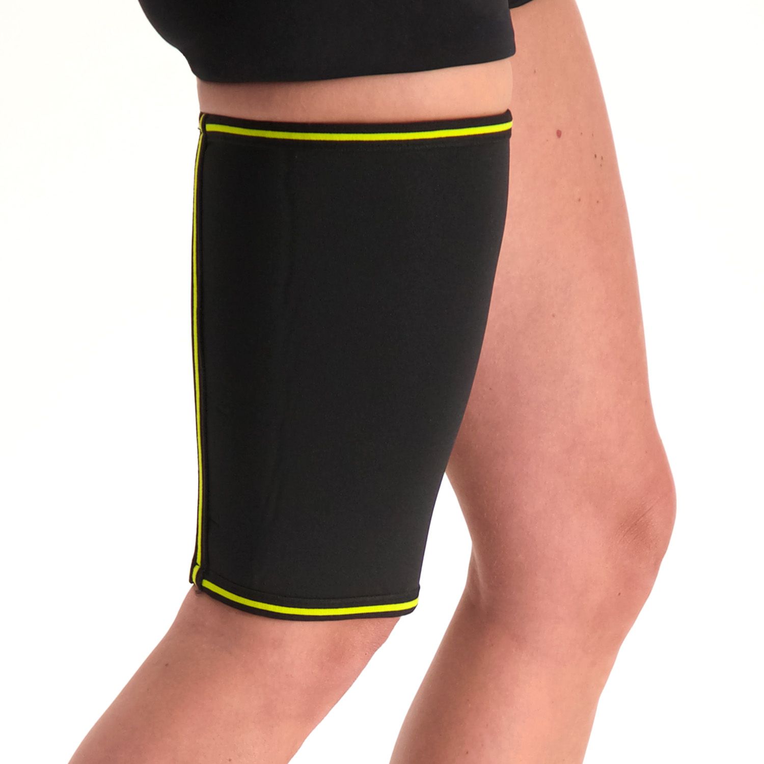 novamed thigh support worn by model around the right thigh with the leg pulled back