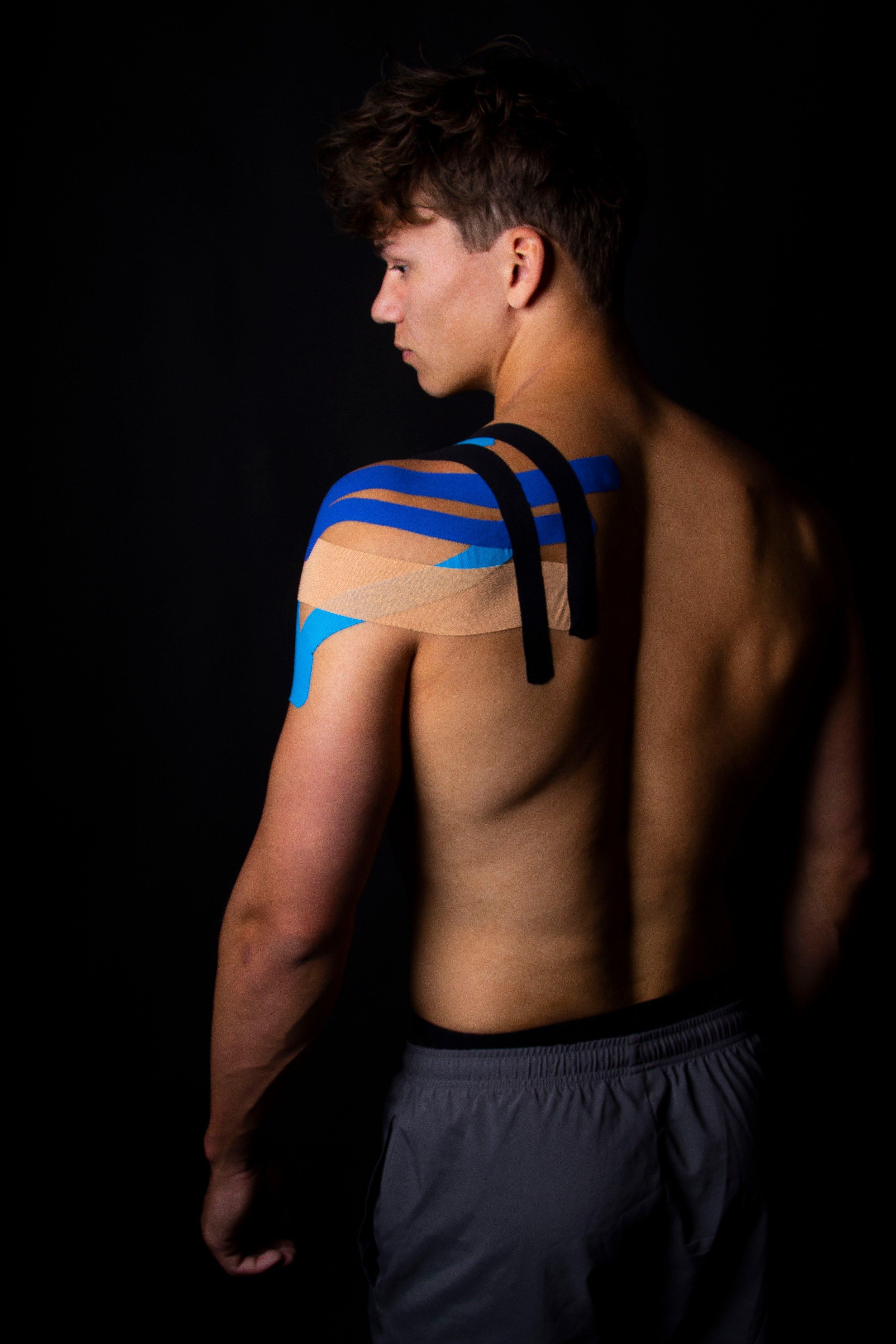 gladiator sports kinesiology strips worn on the back