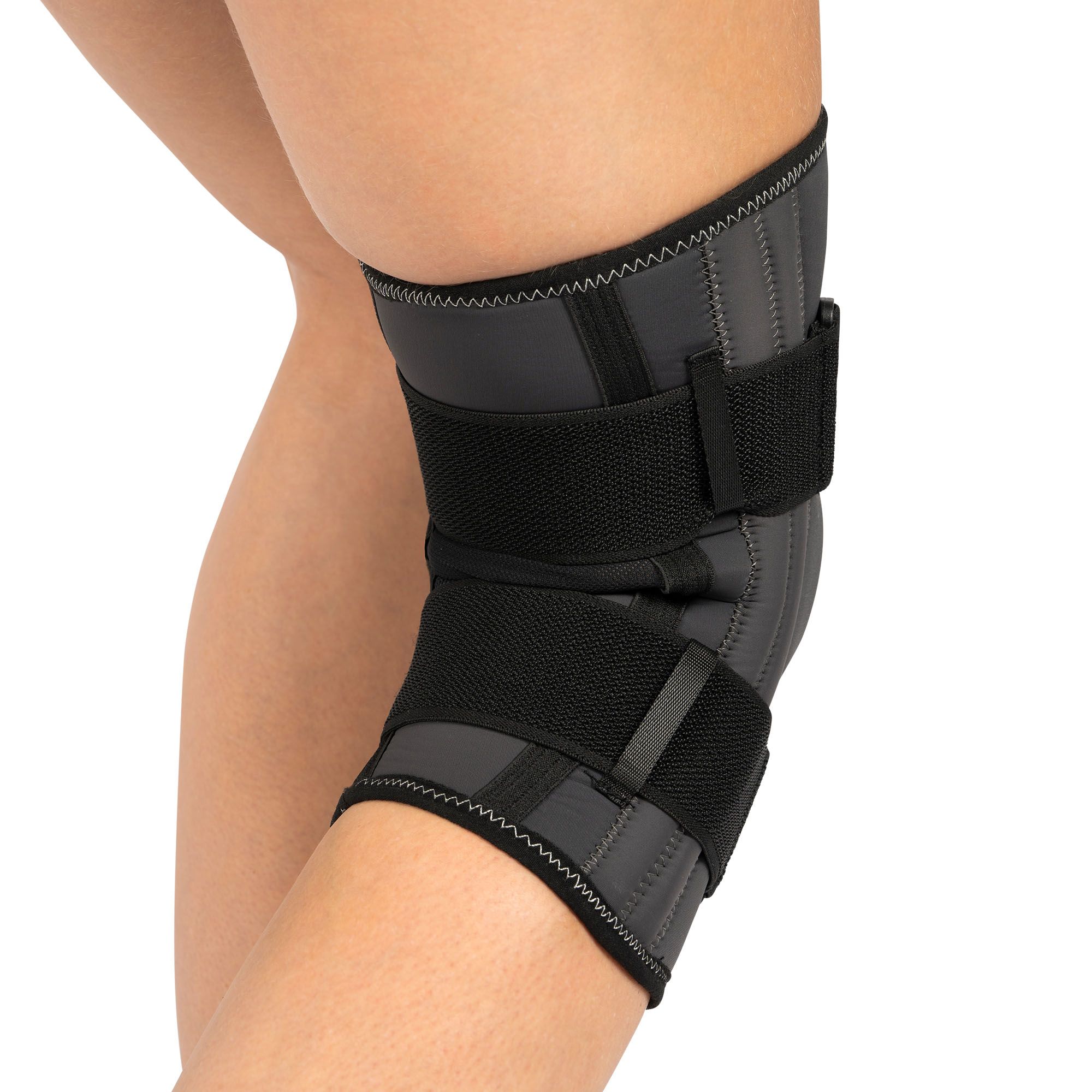 Back view of the One Support Knee Support with Busks worn around right knee