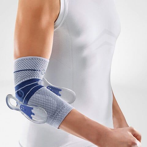 Shape and position of the Bauerfeind EpiTrain Elbow Bandage when worn by model