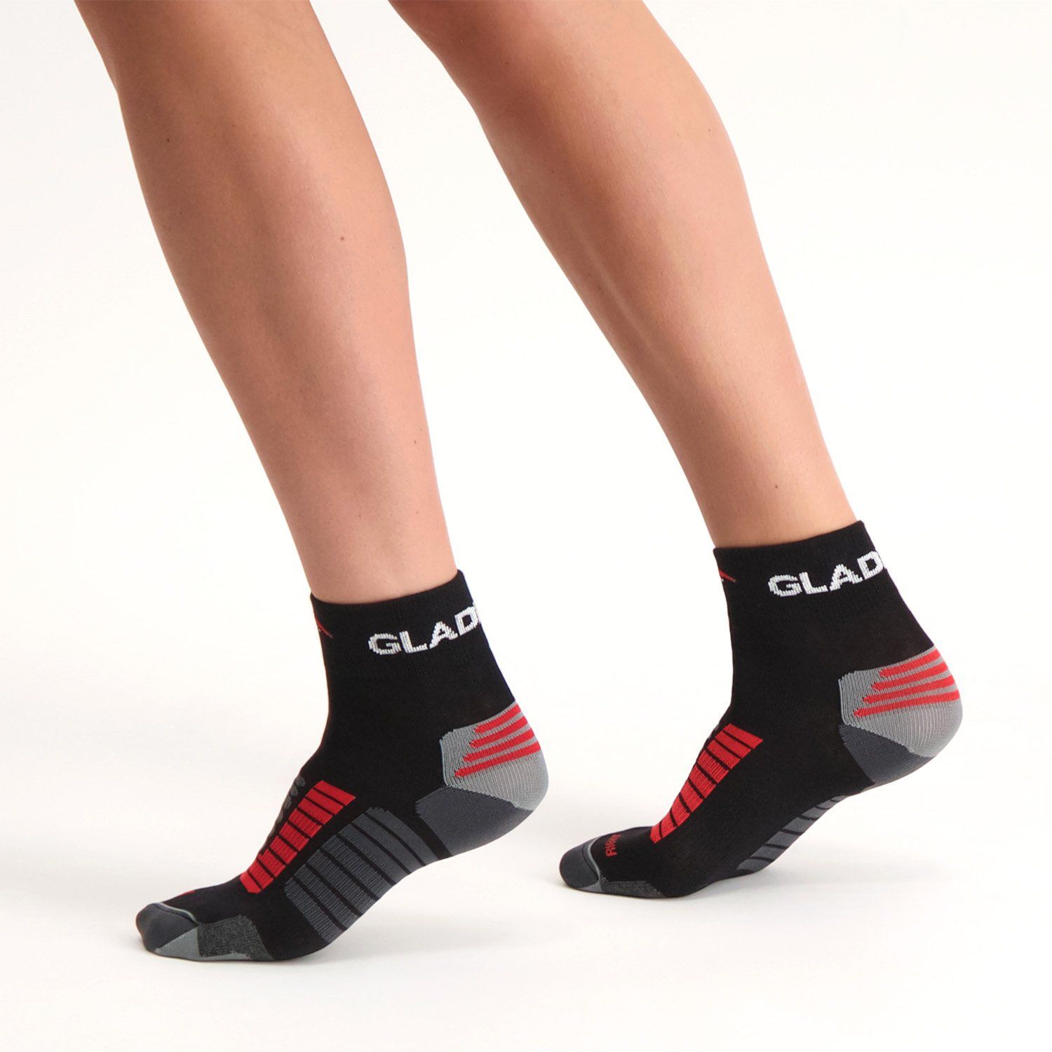 Side view of model wearing the Gladiator Sports Compression Socks in Black