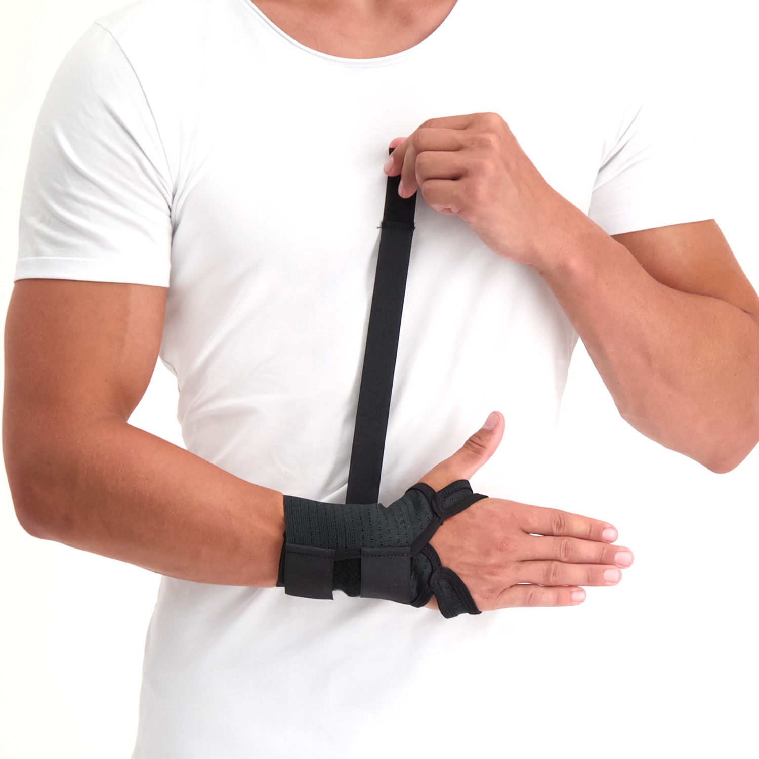 Model strapping the Super Ortho - Carpal Tunnel Syndrome Wrist Support around the right wrist