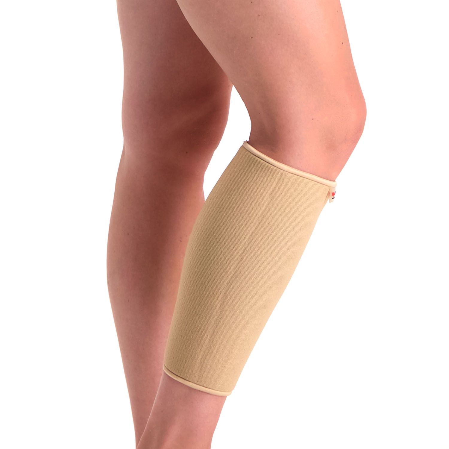 Right side view of model wearing the Super Ortho Calf Support in Beige