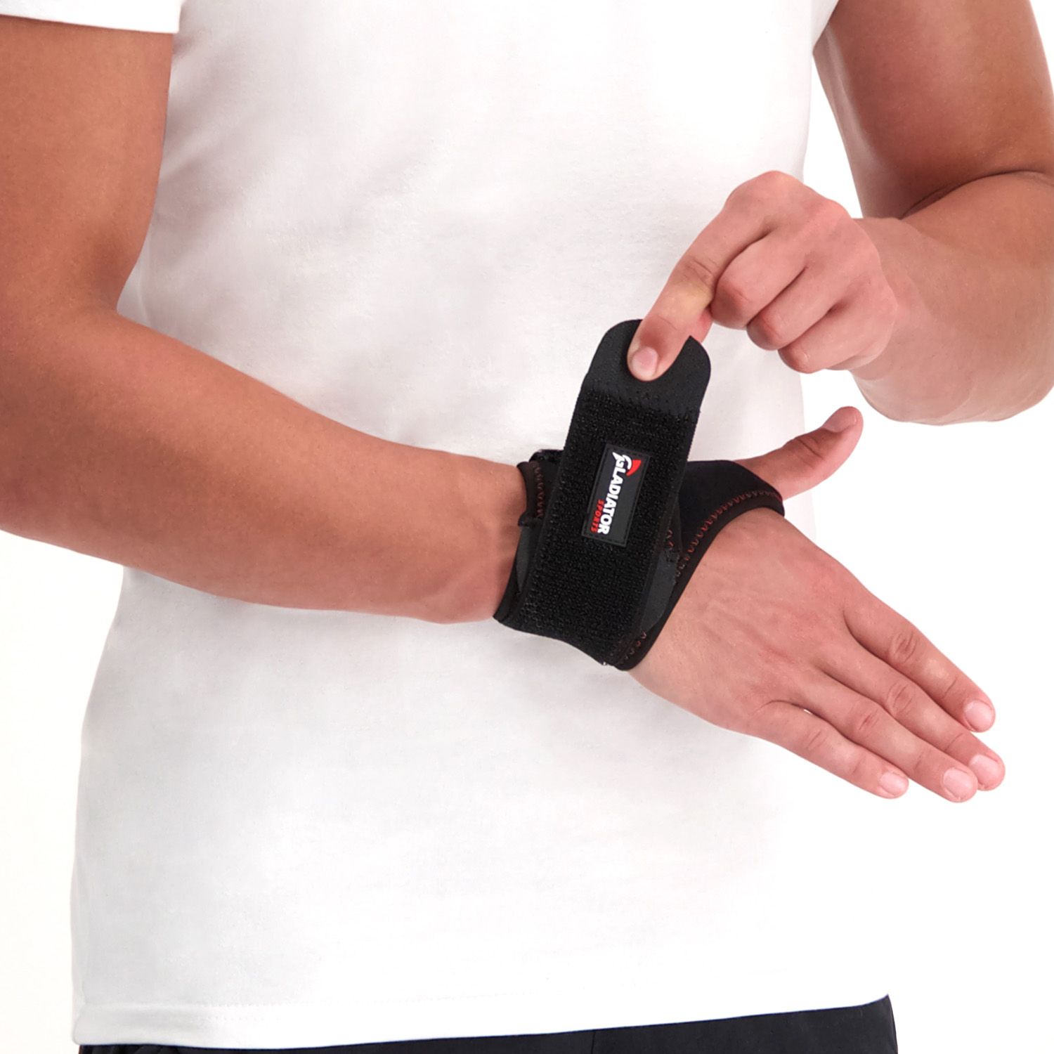 Model strapping the Gladiator Sports Wrist Support around the right wrist