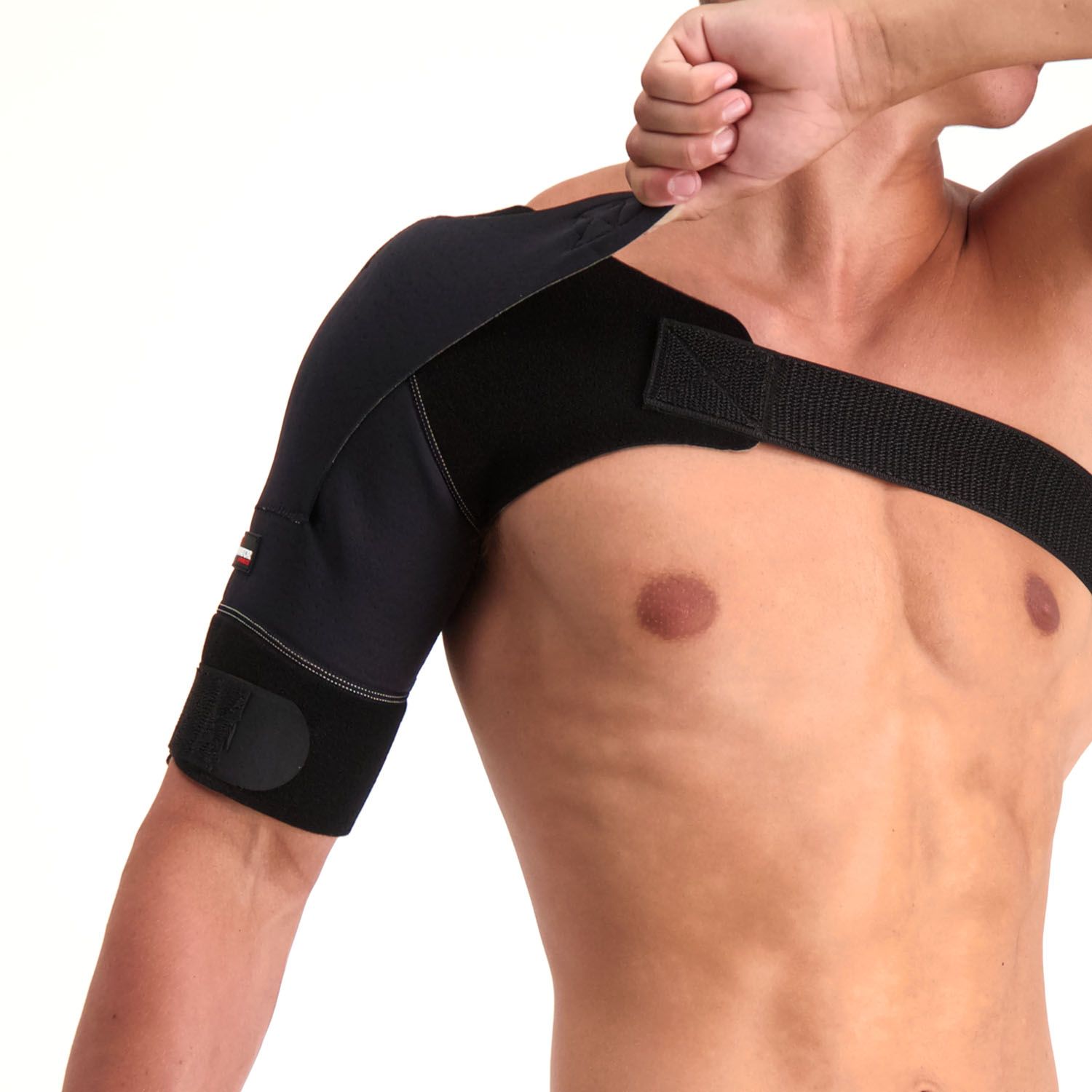 Model tightening the strap of the Gladiator Sports Premium Lightweight Shoulder Support
