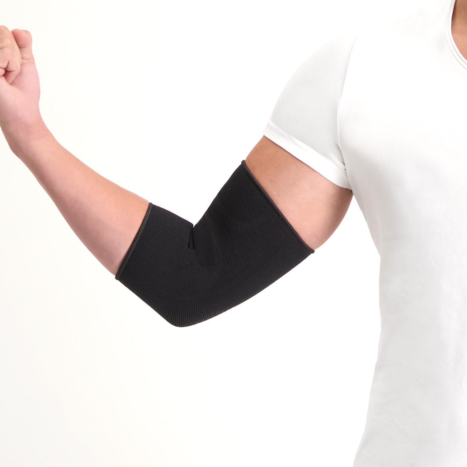 Model verrenkt sich den Arm beim Tragen der Dunimed Ellenbogenbandage Schwarz
