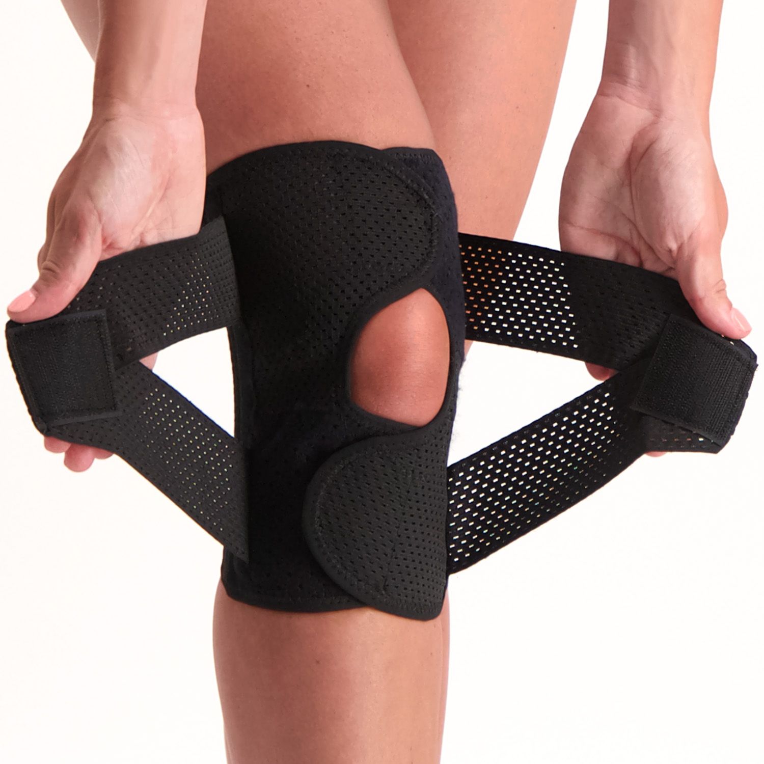 Model demonstrating how the straps of the Dunimed Wrap Knee Support with Busks work