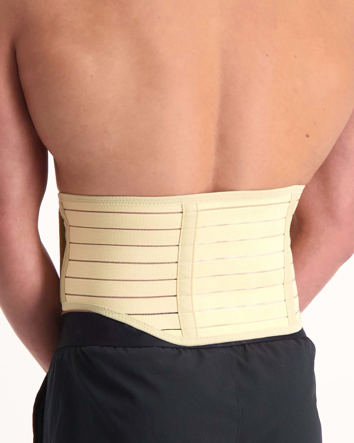 Back view of model wearing the Super Ortho Ceramic Magnetic - Magnetic Back Support