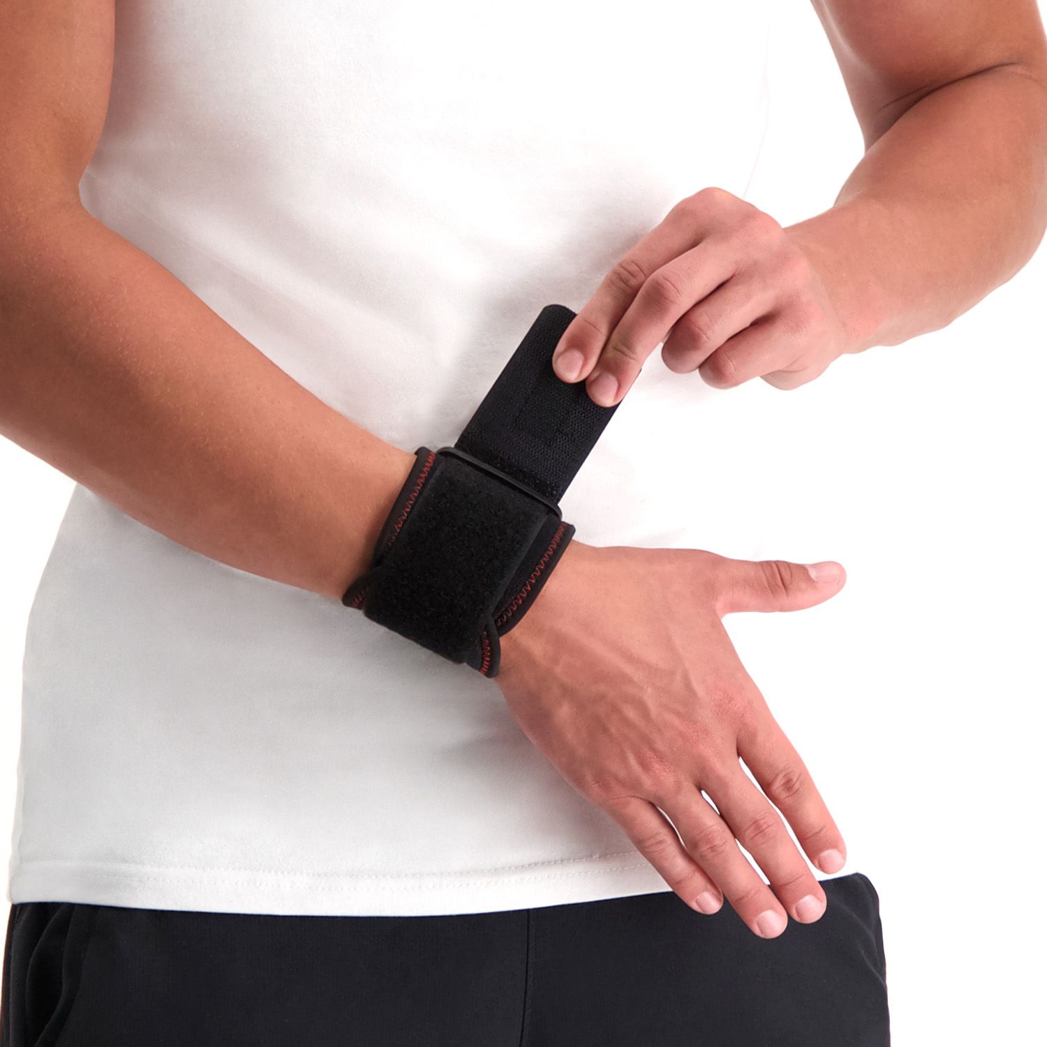 Front view of model strapping the Gladiator Sports Wrist Wrap