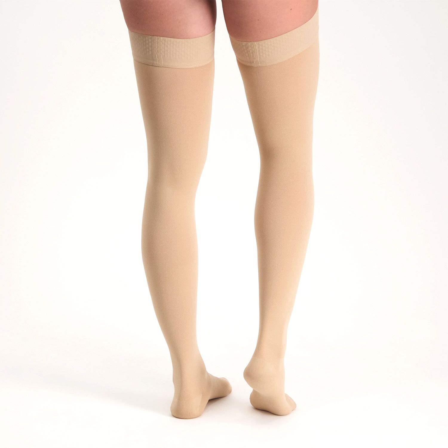 Back view of the Dunimed Premium Comfort Compression Stockings Groin Length - Closed Toe worn by female model