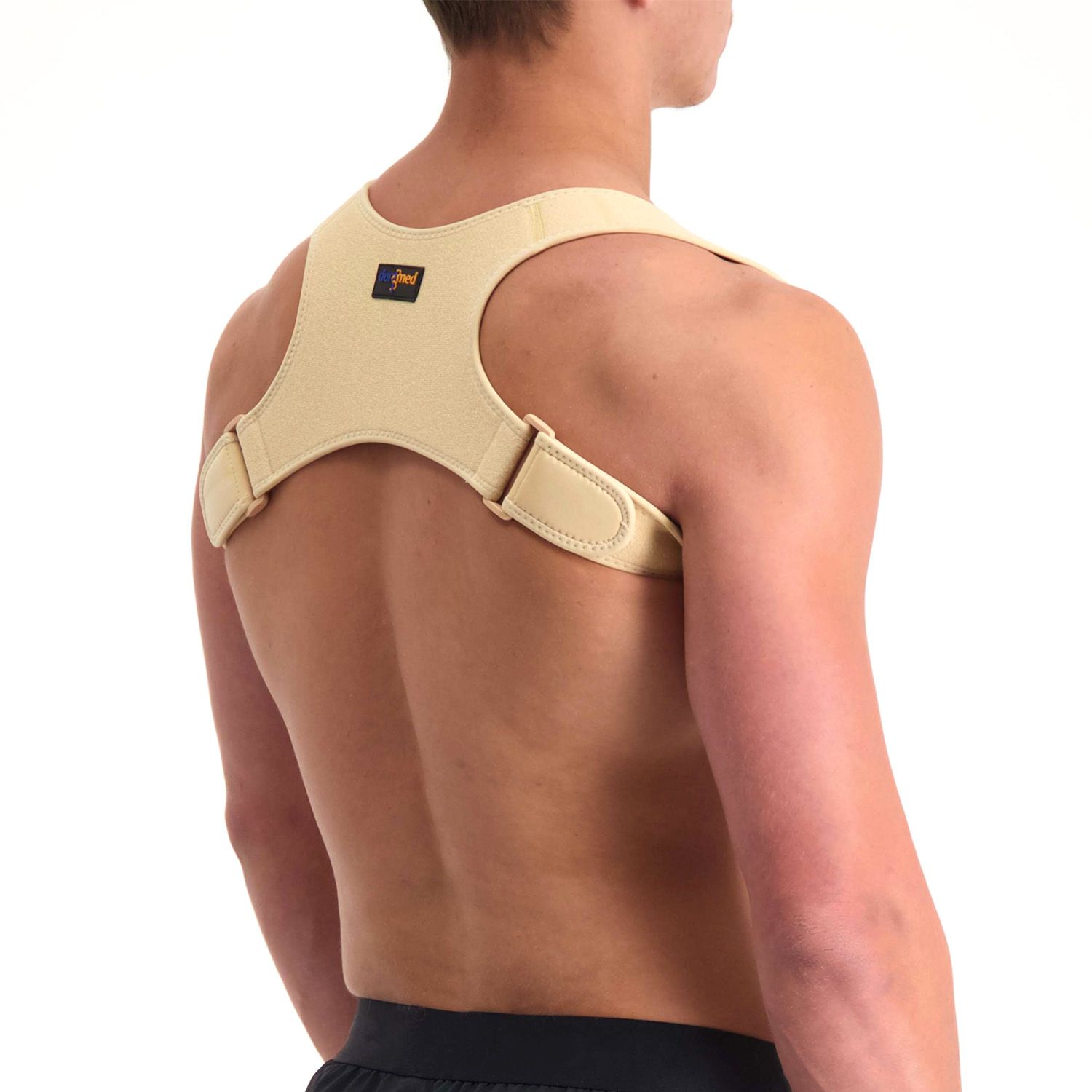 Right side view of model wearing the Dunimed Ventilating Posture Corrector in Beige