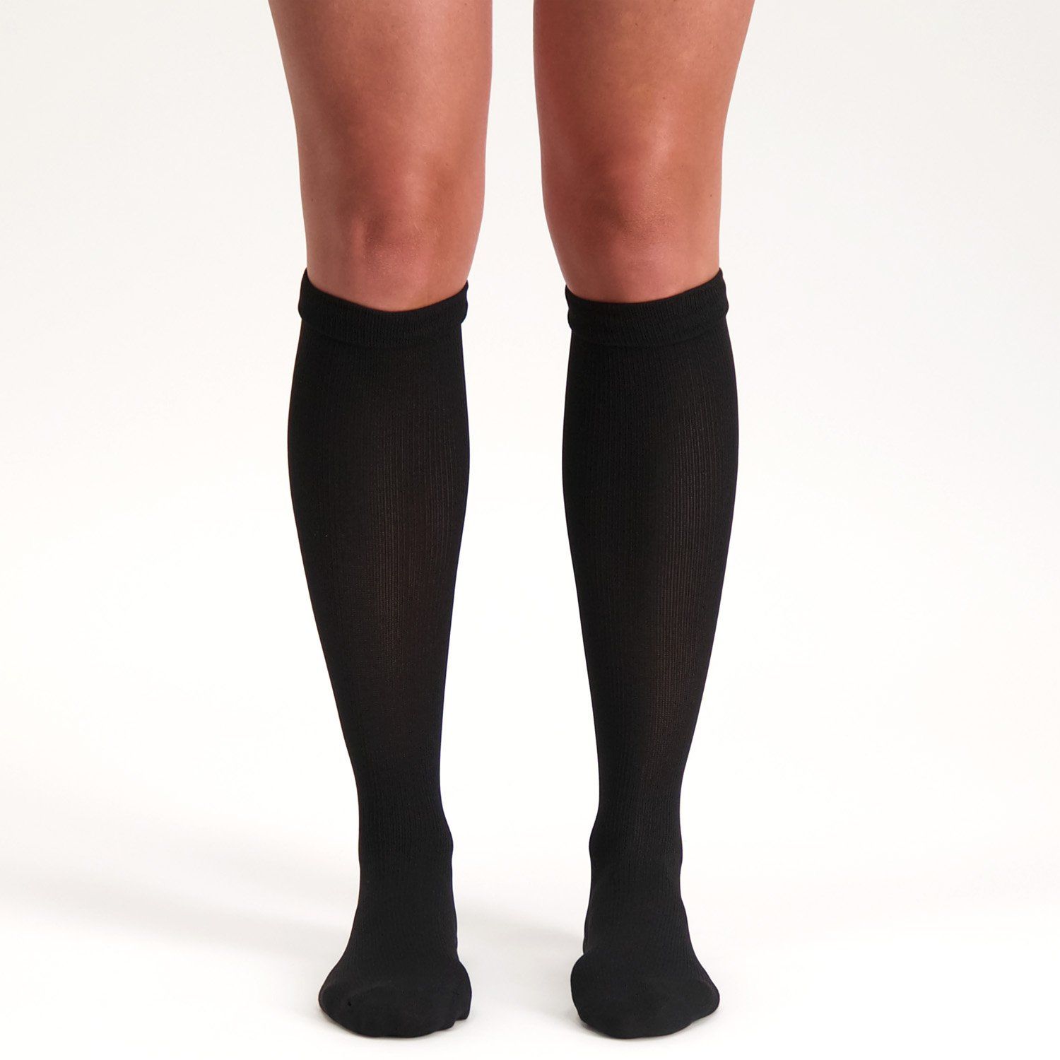 Front view of model wearing the Support Stockings / Travel Stockings - Closed Toe - Black