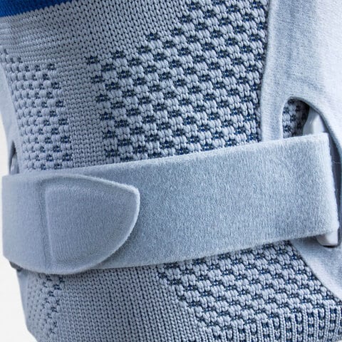 Lower Velcro strap of the Bauerfeind GenuTrain S Hinged Knee Support