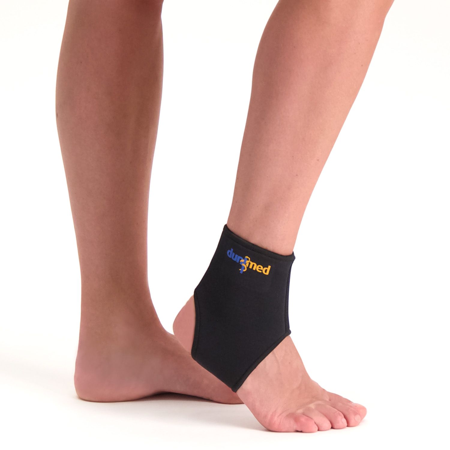 Dunimed ankle support worn on the right ankle by person