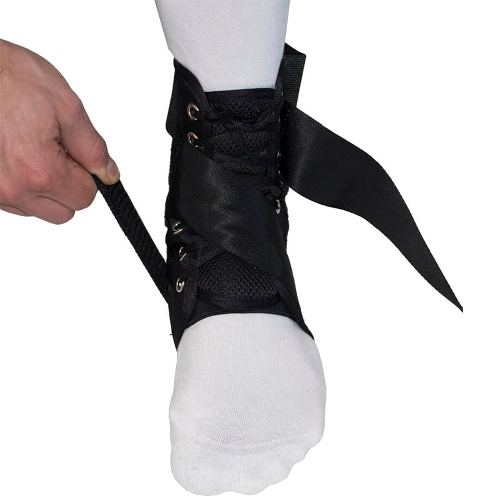 Right side strap of the Gladiator Sports Lightweight Ankle Support with Straps being tightened