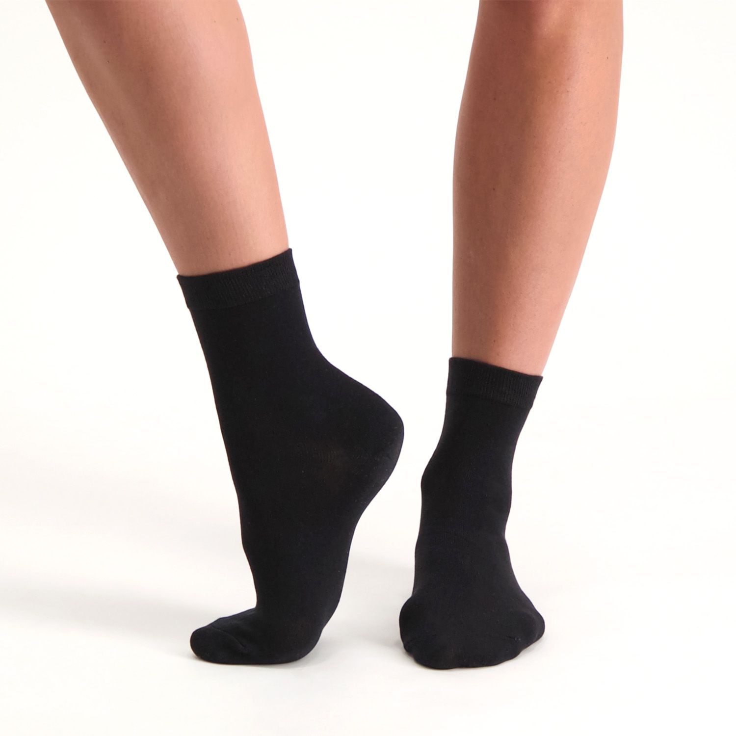 Right side view of model wearing the Solelution Socks with Silicone Gel Heel