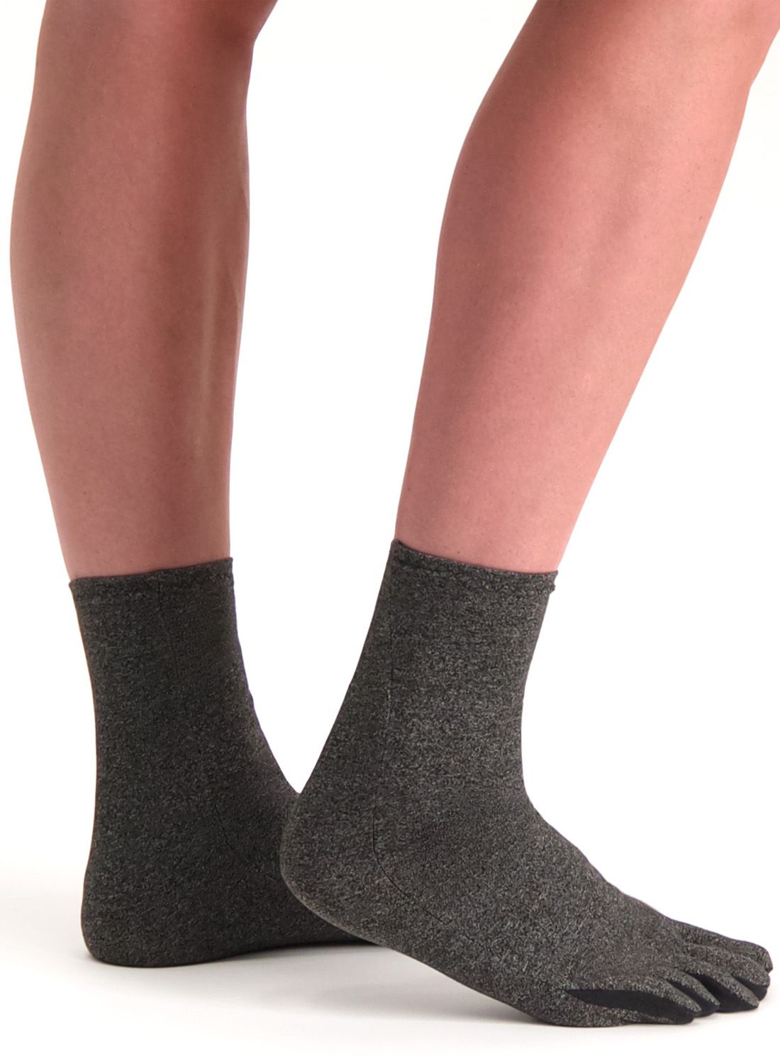Side view of the Dunimed Rheumatoid Arthritis / Osteoarthritis Socks in Grey being worn by model