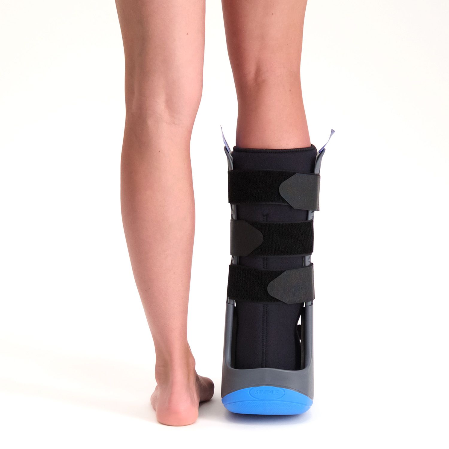 Model wearing the Dunimed ROM Walker Foot Support pictured from the back