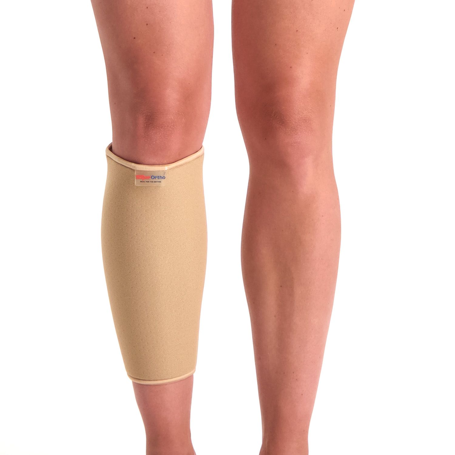 Front view of model wearing the Super Ortho Calf Support in Beige