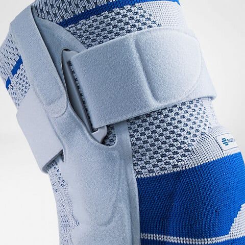 Upper Velcro strap of the Bauerfeind GenuTrain S Hinged Knee Support