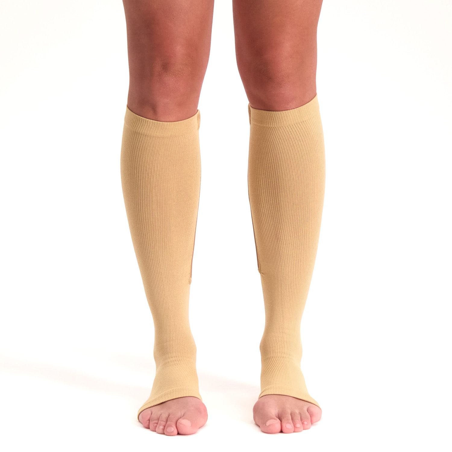Front view of model wearing the Support Stockings with Zipper - Open Toe - Beige on both legs