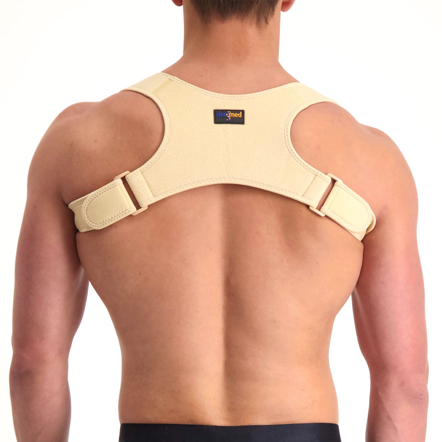 Back view of model wearing the Dunimed Ventilating Posture Corrector in Beige