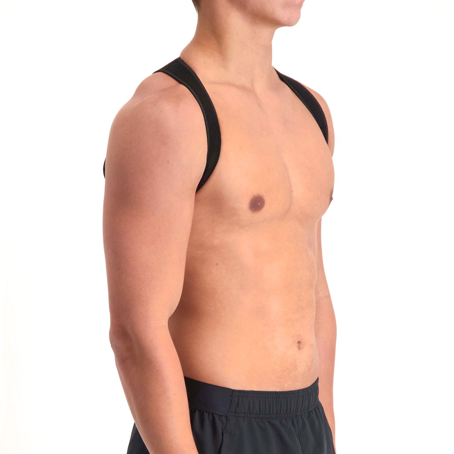Right side view of model wearing the Dunimed Ventilating Posture Corrector in Black