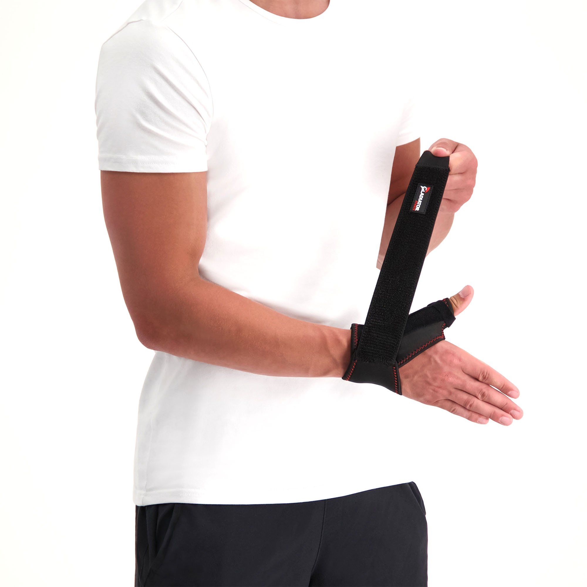 Gladiator Sports Thumb / Wrist Support being strapped by model