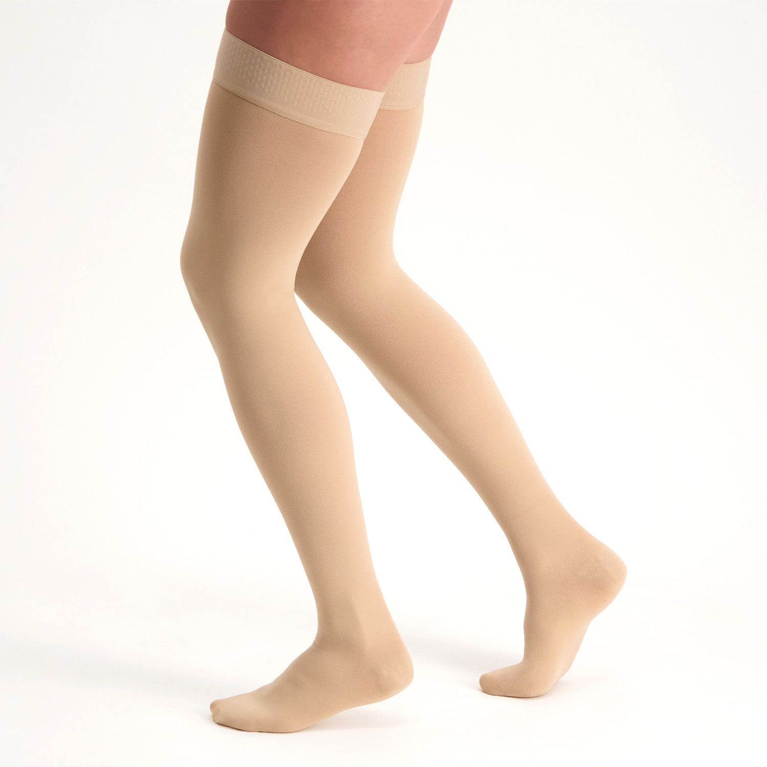 Female model wearing the Dunimed Premium Comfort Compression Stockings Groin Length - Closed Toe while walking