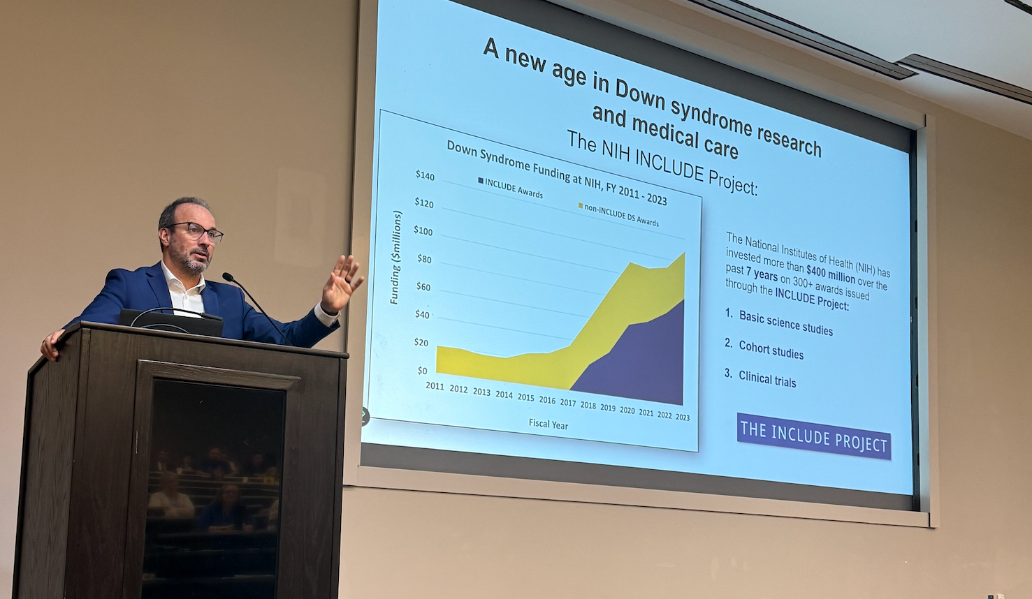 Dr. Joaquin Espinosa presenting at a podium