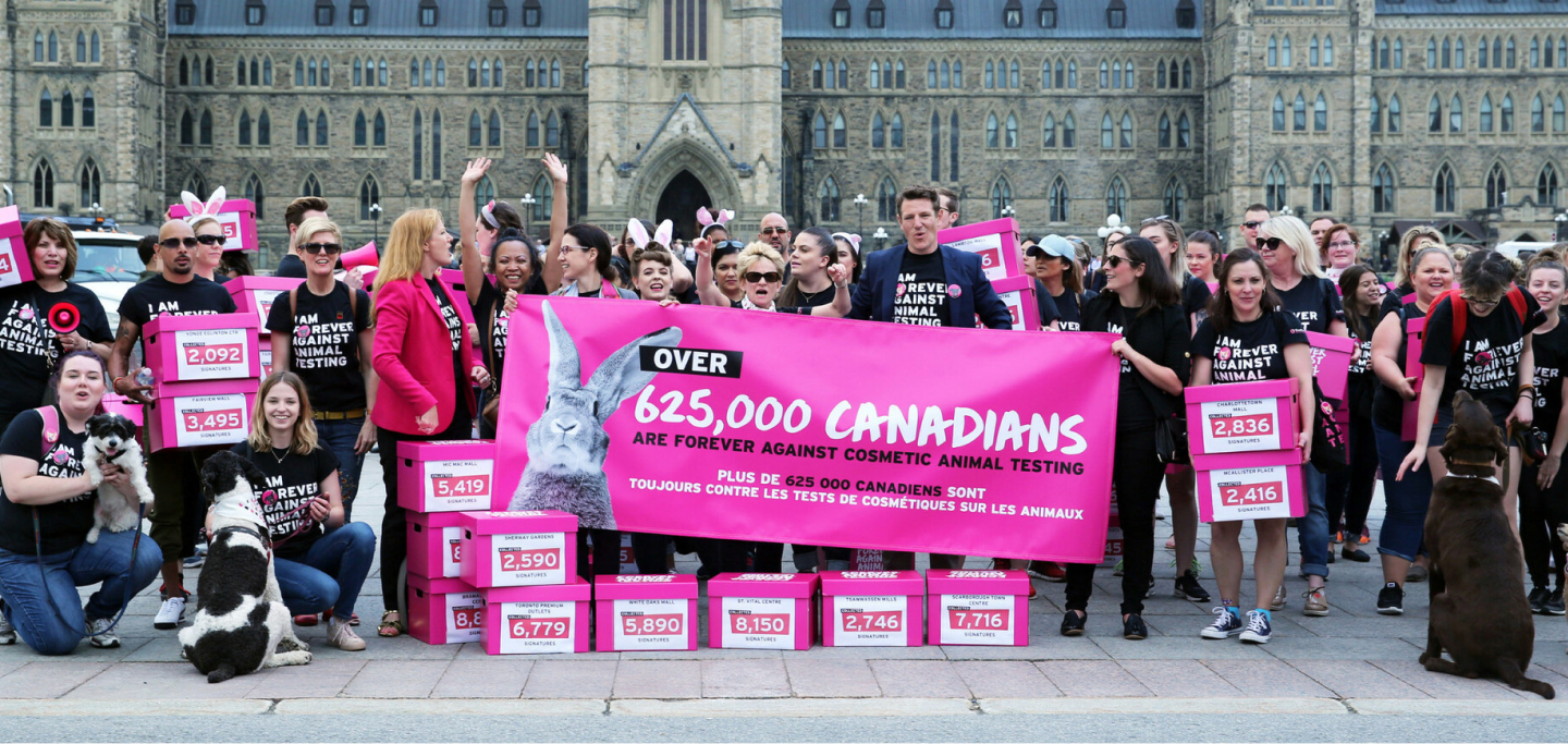 Protesters stand outside the Capital in Ottawa as prat of the Forever Against Animal Testing campaign in Canada 