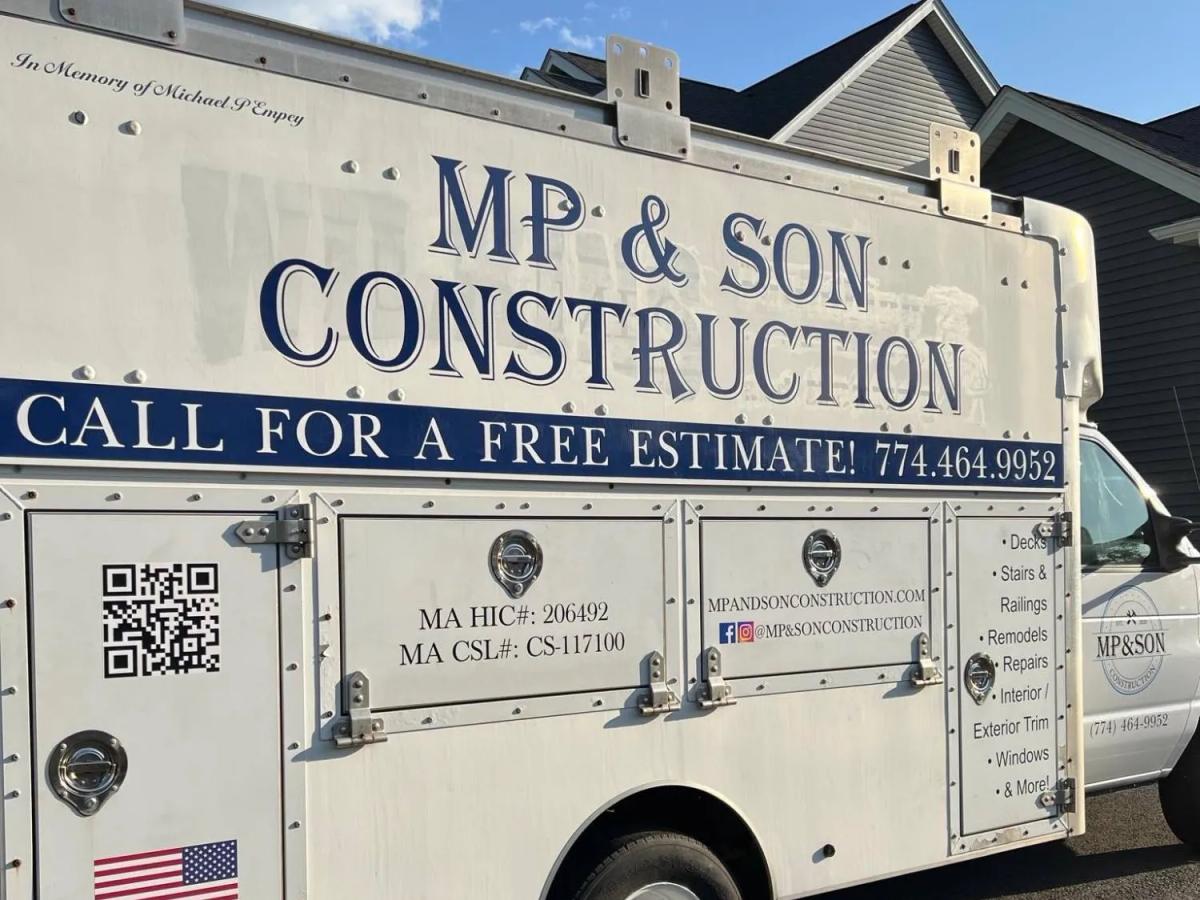 White MP & Son Construction box truck lettered In Memory of Michael P Empey
