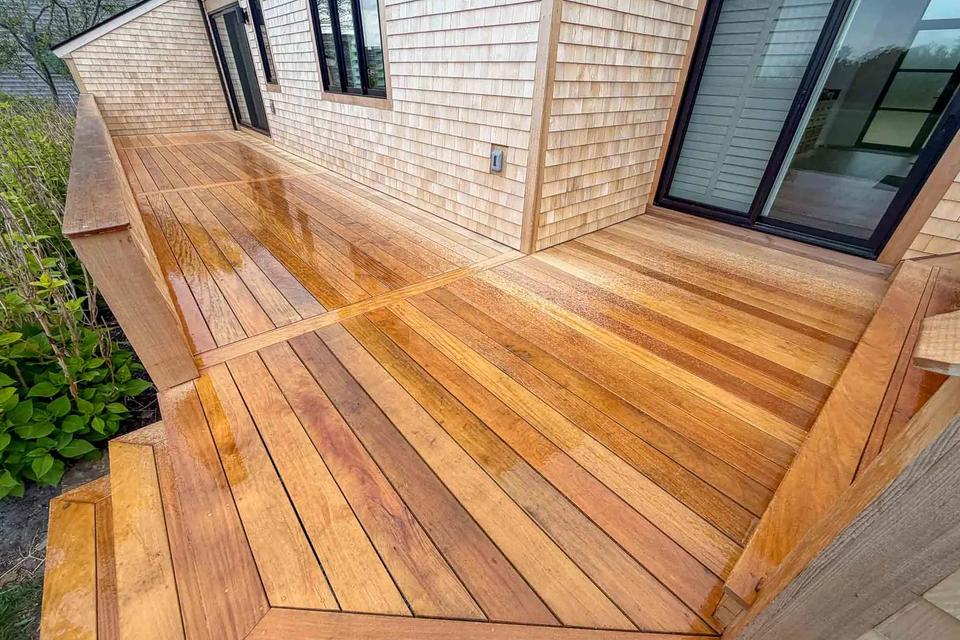 Angled Garapa deck boards with a picture-frame border