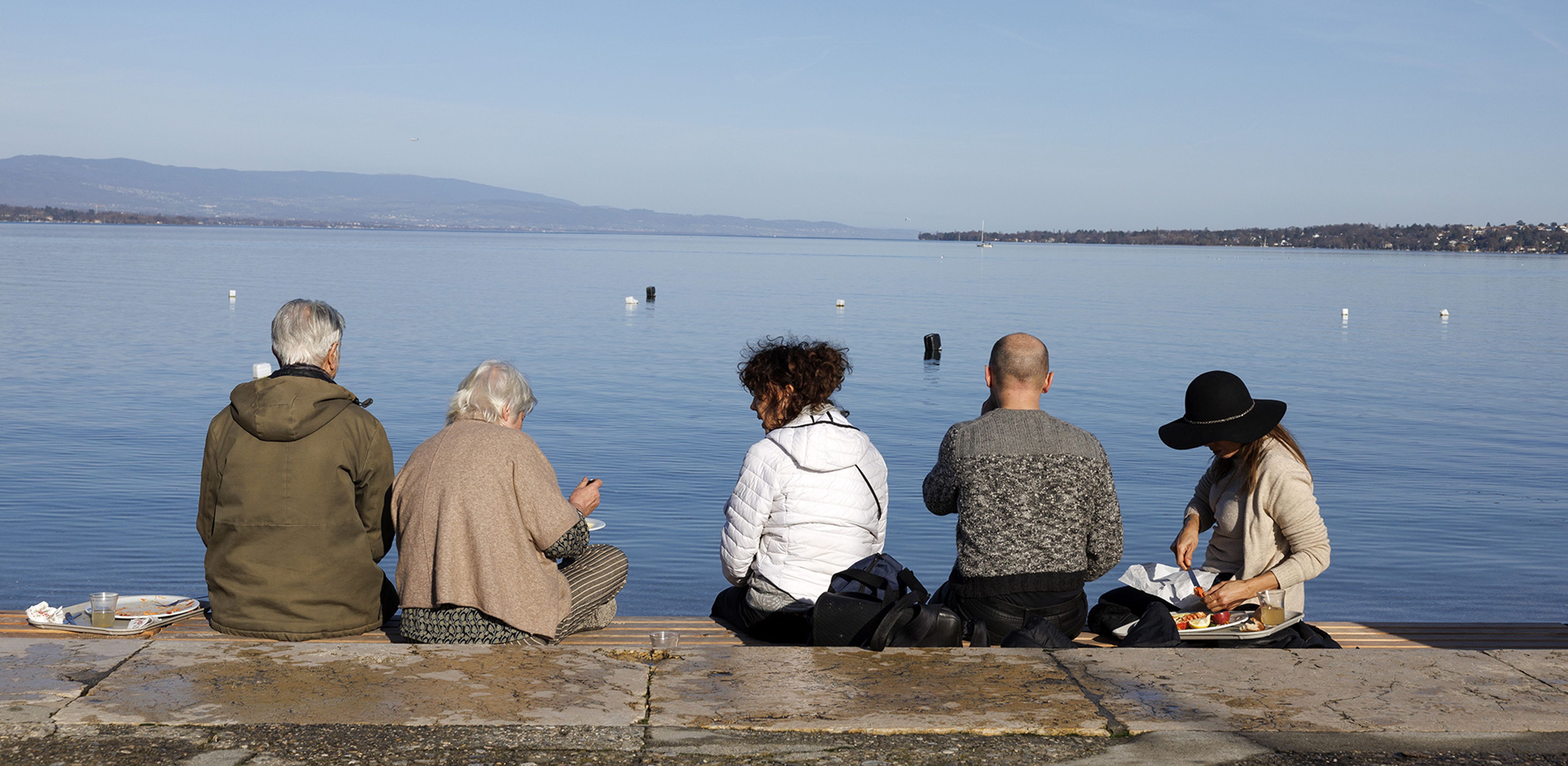 Menschen am Genfersee.
