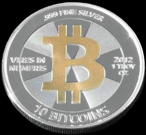 Close-up of a Casascius physical silver Bitcoin coin with private key hidden inside - Flush