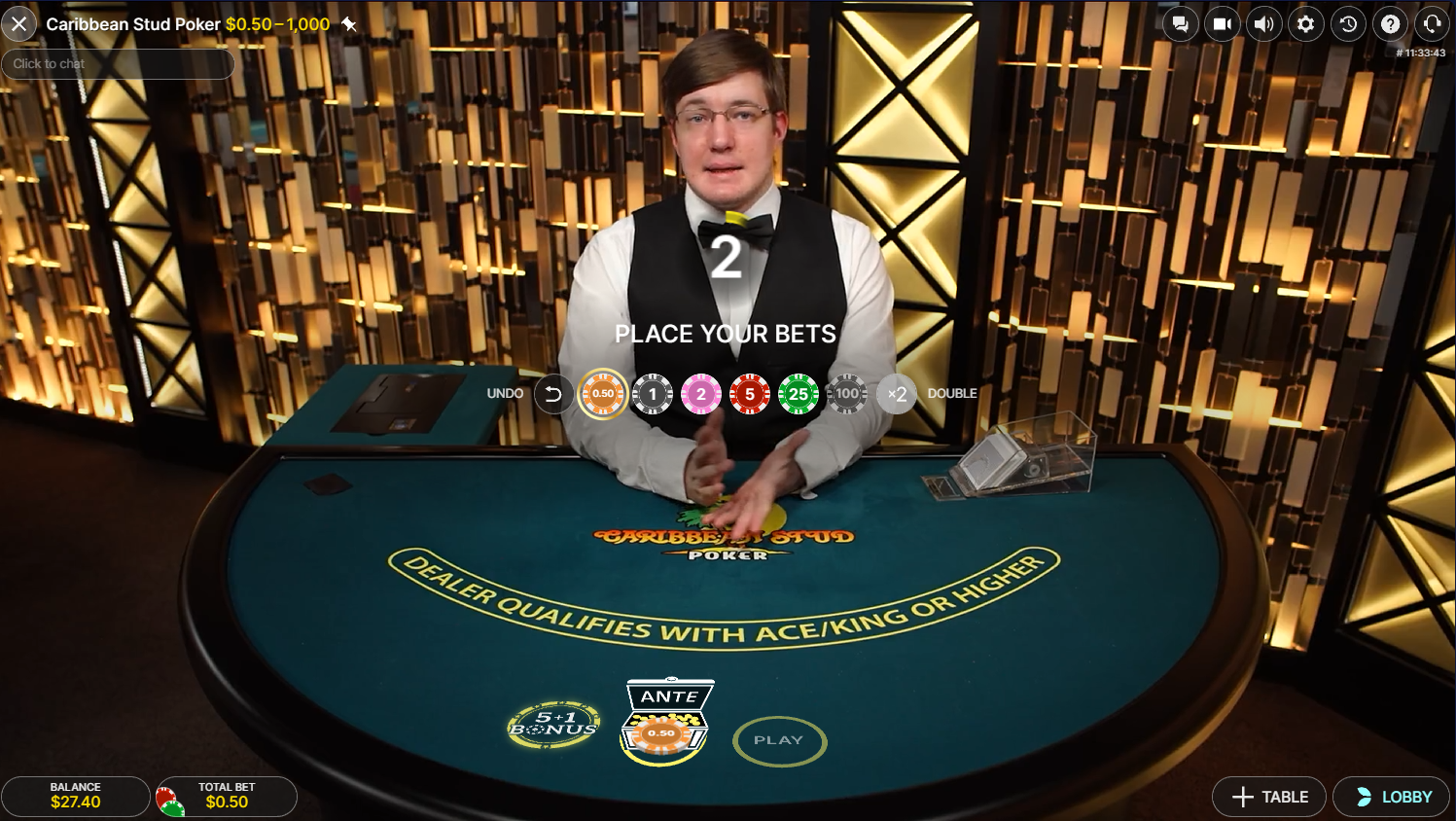 EvolutionのライブカジノCaribbean Stud Poker、ベッティングフェーズでチップを使ってアンティベットを置いた様子。